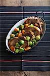 Pork chops with Brussels sprouts and apricots