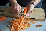 Carrots being peeled