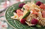 Pasta salad with salmon, asparagus, rise breeze and a lemon vinaigrette (close-up)