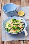 Ffarfalle salad with broccoli, peas and baked salmon