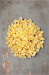A pile of conchiglie rigate pasta