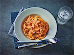 Spaghetti with tomatoes, chilli and bacon (seen from above)