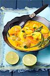 Indian vegetarian curry with pumpkin, pineapple, beans and potatoes