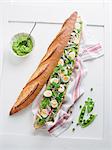 Baguette with avocado and pea cream