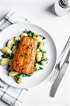 Grilled salmon with gnocchi and greens