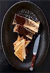 Marrowbones with red wine gravy and toast triangles