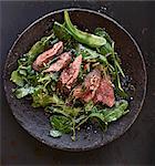 Wild lettuce with peppered steak