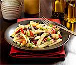 Casarecce gluten free pasta with peppers, olives, herbs and olive oil