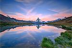 The Matterhorn reflected in Lake Stellisee at dawn, Zermatt, Canton of Valais, Pennine Alps, Swiss Alps, Switzerland, Europe