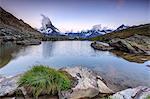 The Matterhorn reflected in Lake Stellisee at dawn, Zermatt, Pennine Alps, Canton of Valais, Swiss Alps, Switzerland, Europe