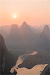 Sunset over Karst peaks with Li river (Lijiang) view from hilltop of Mt. Laozhai (Laozhaishan/Old fortress hill), Xingping, Yangshuo, Guilin, Guanxi, PRC