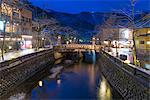 Snow on Otani river at night, Kinosaki Onsens (Hot springs) in winter. Kinosaki Hyogo Prefecture, Kansai, Japan