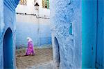 Local women walking through the blue streets of the Medina, Chefchaouen, Morocco, North Africa, Africa