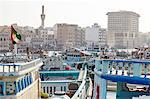 Transport boats lined up at Dubai Creek, Dubai, United Arab Emirates, Middle East