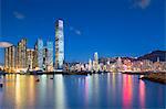 International Commerce Centre (ICC) and Yau Ma Tei Typhoon Shelter at dusk, West Kowloon, Hong Kong, China, Asia