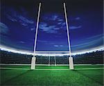 Rugby goal in a stadium at night