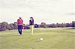 Golfers walking on course, Korschenbroich, Dusseldorf, Germany