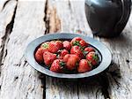 Strawberries in metal bowl