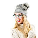 Smiling Hipster Girl in Knitted Sweater and Beanie Hat Isolated on White. Youth Winter Fashion Concept.