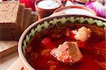 The pieces of meat in the borscht soup as the main ingredient of this dish.