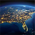 Night planet Earth with precise detailed relief and city lights illuminated by moonlight. North America. USA. Gulf of Mexico and Florida. Elements of this image furnished by NASA
