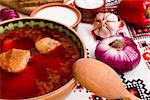 The pieces of meat in the borscht soup as the main ingredient of this dish.