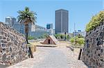 CAPE TOWN, SOUTH AFRICA - DECEMBER 18, 2014:  The view towards the central business district seen from the entrance to the Castle of Good Hope with the powder magazine in front