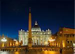 St. Peter's cathedral  in Rome at night with lights, Italy