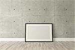 Blank picture frames with concrete wall and wooden parquet decor like loft style, background, template design