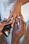 Man proposing to his girlfriend in their new house