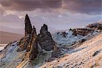 Snow dusted Old Man of Storr at sunrise, Isle of Skye, Inner Hebrides, Scotland, United Kingdom, Europe