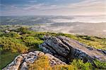 Mist covered village of Chagford and rolling countryside from Meldon Hill, Dartmoor National Park, Devon, England, United Kingdom, Europe