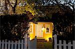 Illuminated wooden house
