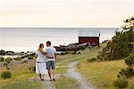 Couple waling at sea