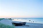 Boat on beach at dusk