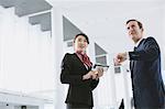 Japanese attractive flight attendant helping customer at the airport