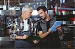 Team of brewers working together at the local brewery