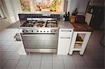 Cooker in stylish kitchen at home