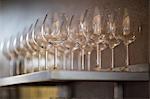 Wine glasses on shelf in a fancy restaurant
