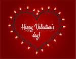 Valentines day background. Garland with bright lights in the shape of heart