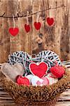 Many hearts inside an old wooden basket