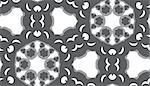 Seamless black and white geometric kaleidoscope pinwheel pattern