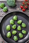 Fresh and healthy organic brussel sprouts in a frying pan