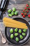Fresh and healthy organic brussel sprouts in a frying pan
