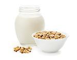 Soy milk in a glass jar and soybeans Isolated on white background