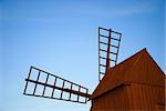 Sunlit old traditional windmill at the Swedish island Oland in the Baltic Sea