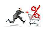 Businessman pushing shopping cart with percentage sign isolated on white background