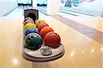 Colorful Bowling balls in ball return