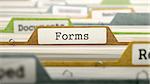 Forms on Business Folder in Multicolor Card Index. Closeup View. Blurred Image. 3D Render.