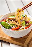 Delicious asian rice glass noodles with vegetables and chicken (wok)